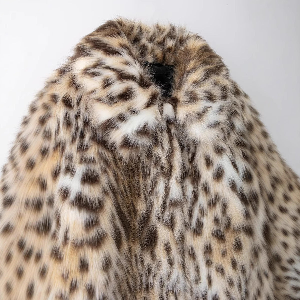 Versatile artificial fur effect fur coat